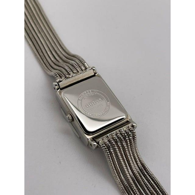Guess Ladies Silver Tone Dial Silver Tone Bracelet Watch G75679L