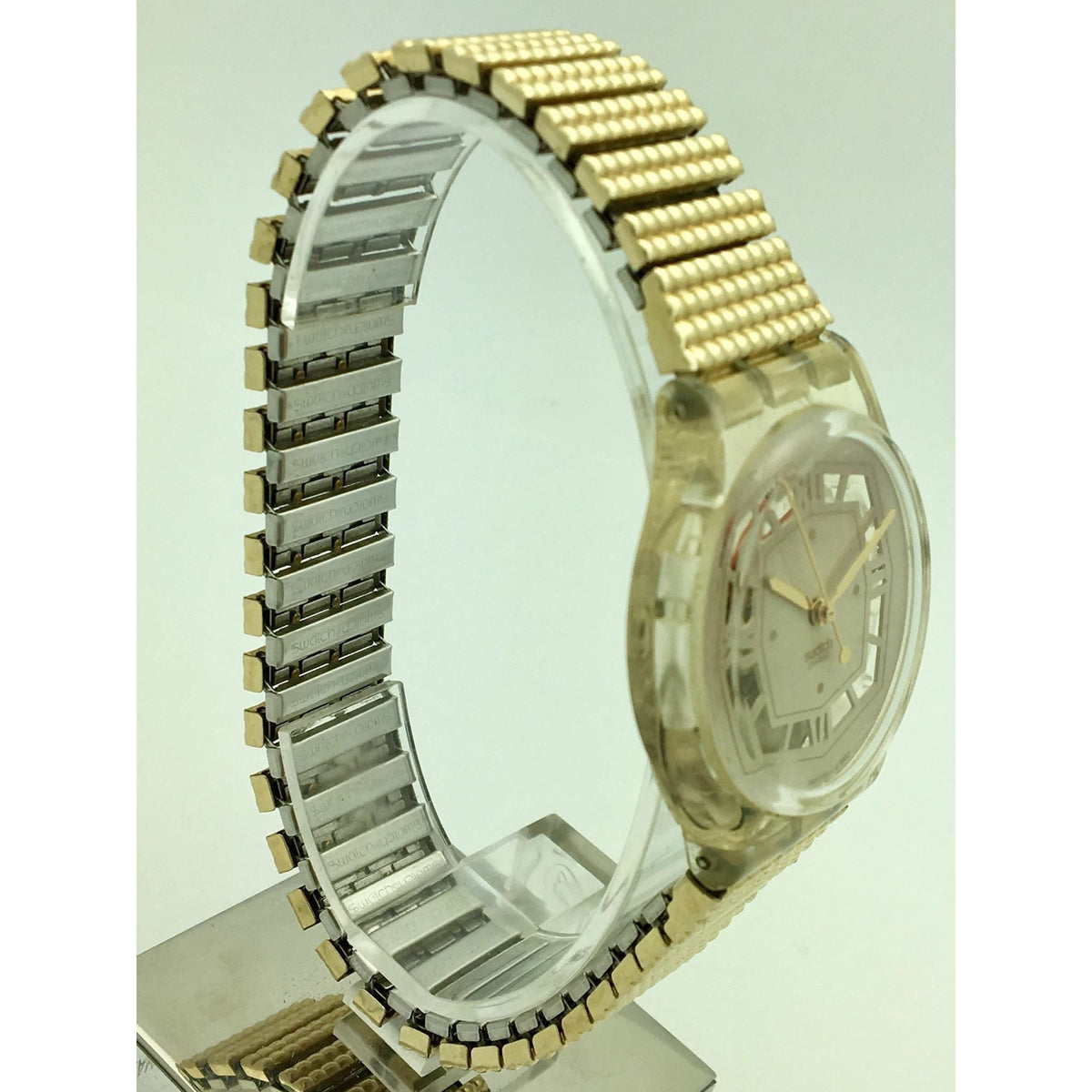 Swatch Swiss Ladies Yellow Gold Tone Stretch Band Watch 6746