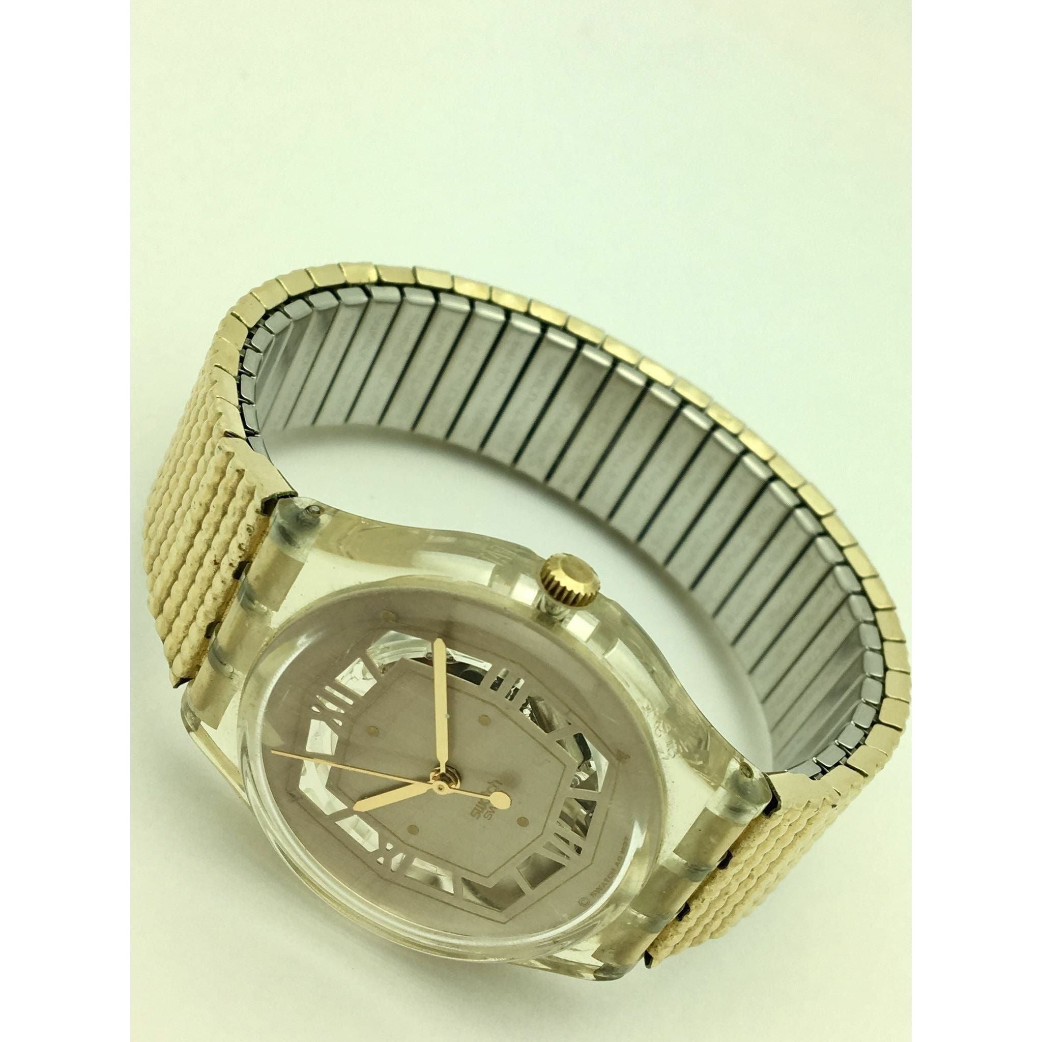 Swatch Swiss Ladies Yellow Gold Tone Stretch Band Watch 6746 – ELI
