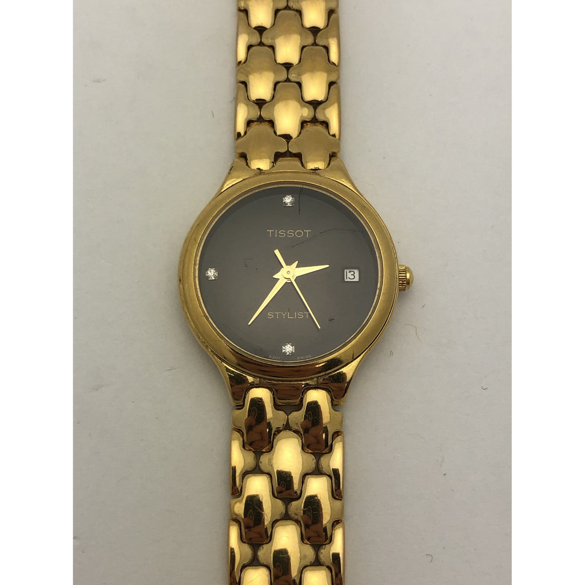 Tissot Ladies Stylist Black Dial Gold Tone Stainless Steel Watch K201