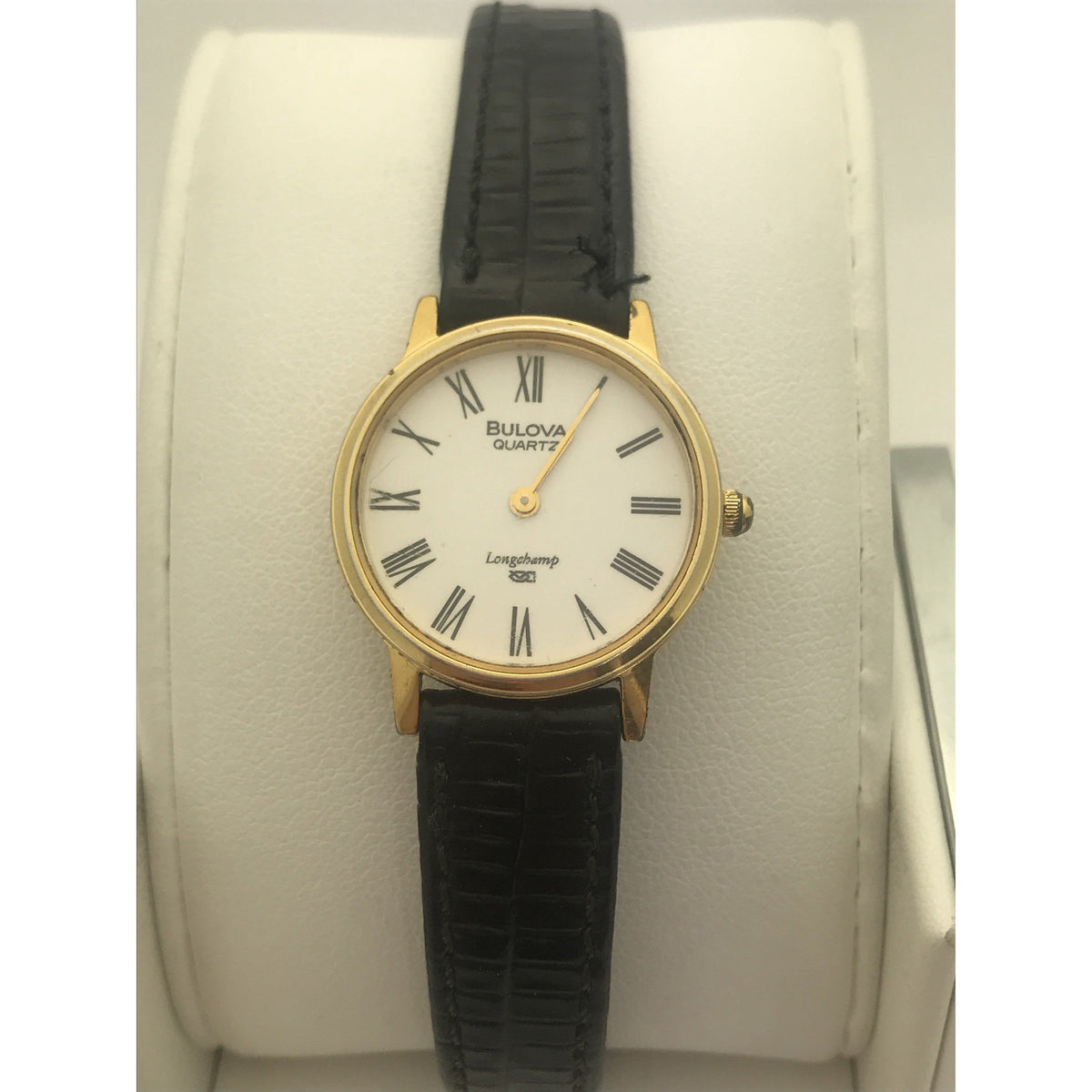 Bulova Ladies Longchamp Quartz White Dial Black Leather Strap Watch 056407