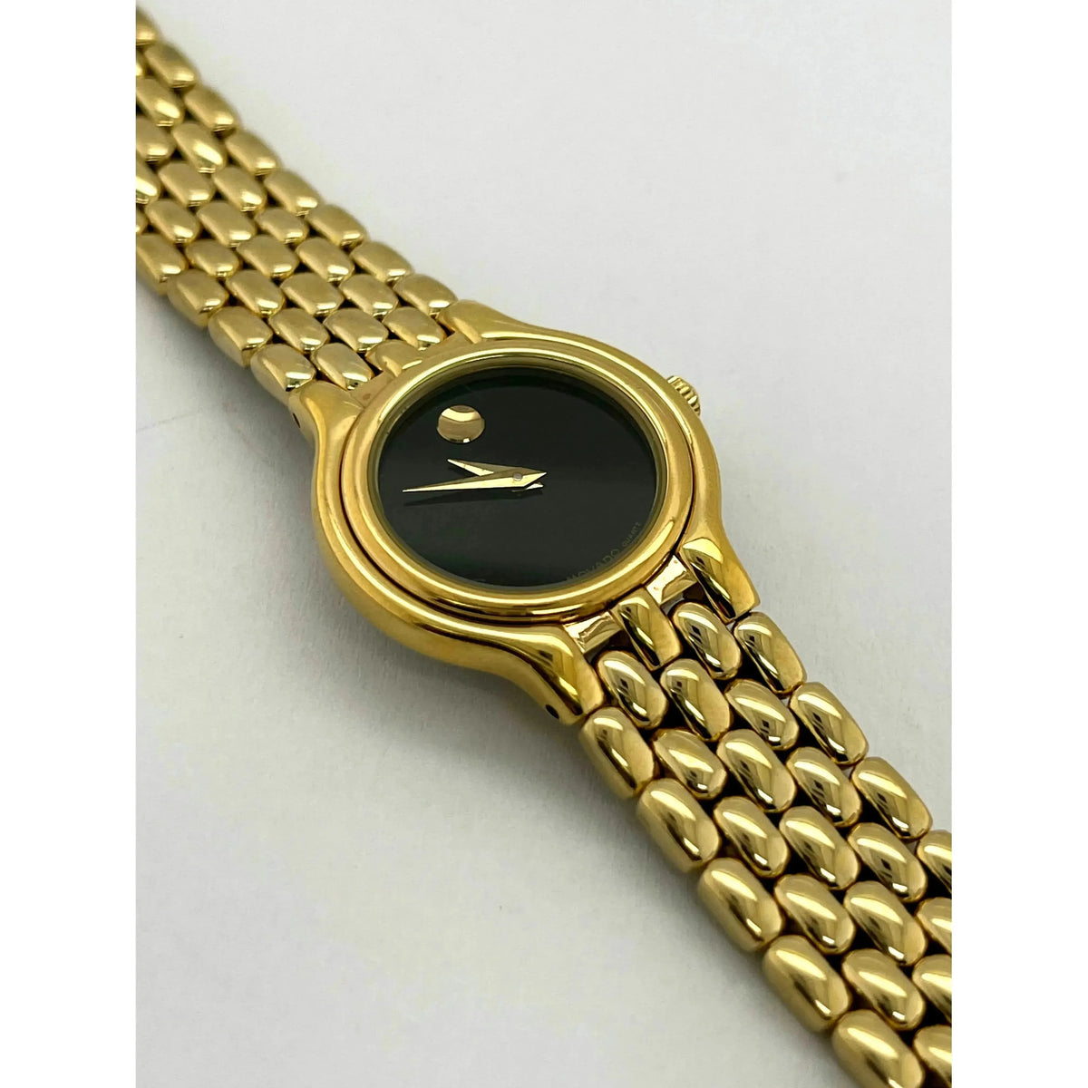 Movado Ladies Black Dial Yellow Gold Tone Bracelet Watch 0600711