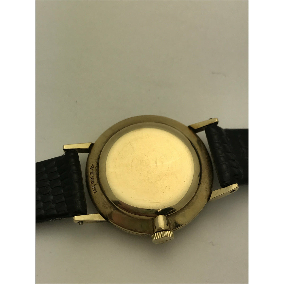 Movado Ladies 14K Yellow Gold Case Black Dial Black Leather Strap Watch