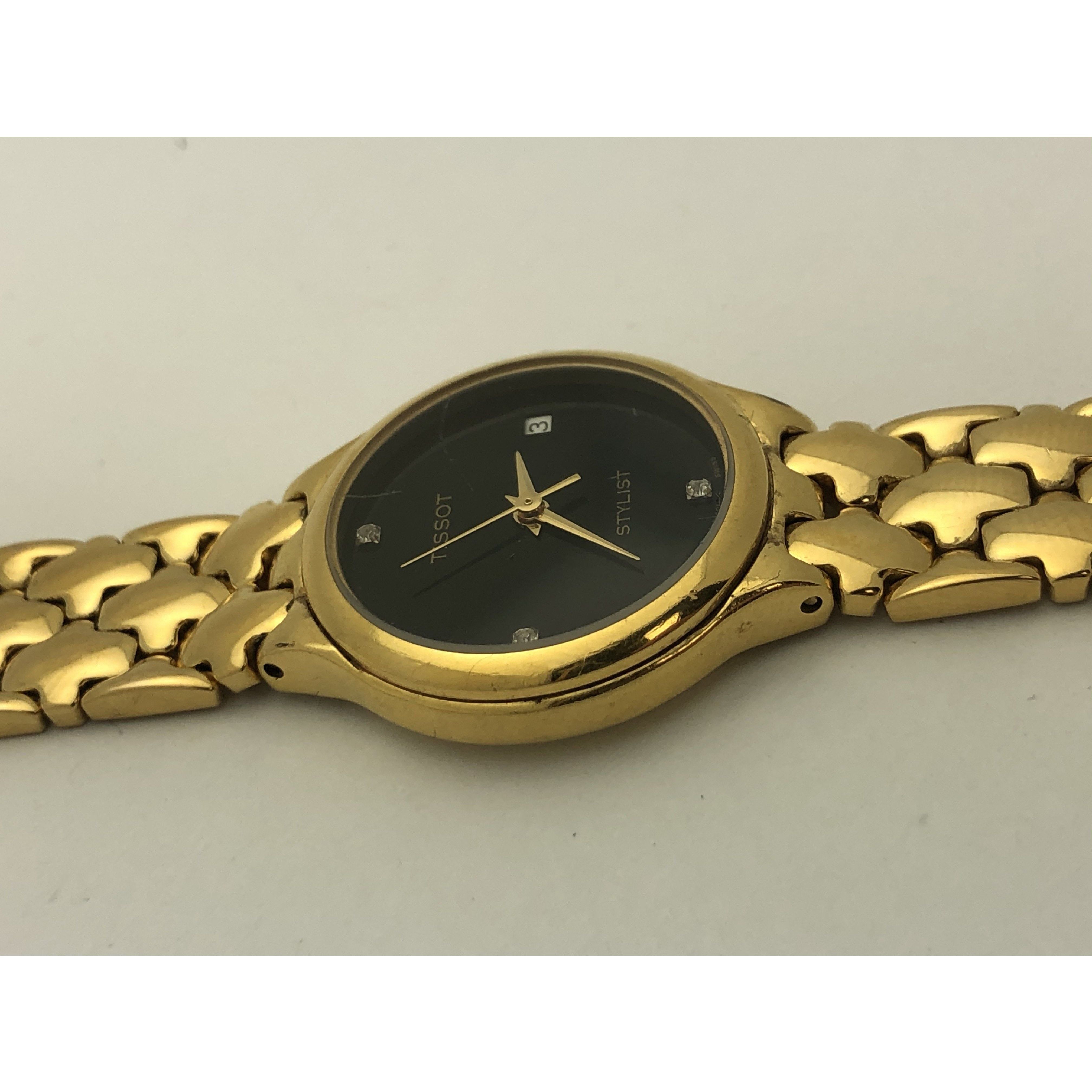 Tissot Ladies Stylist Black Dial Gold Tone Stainless Steel Watch