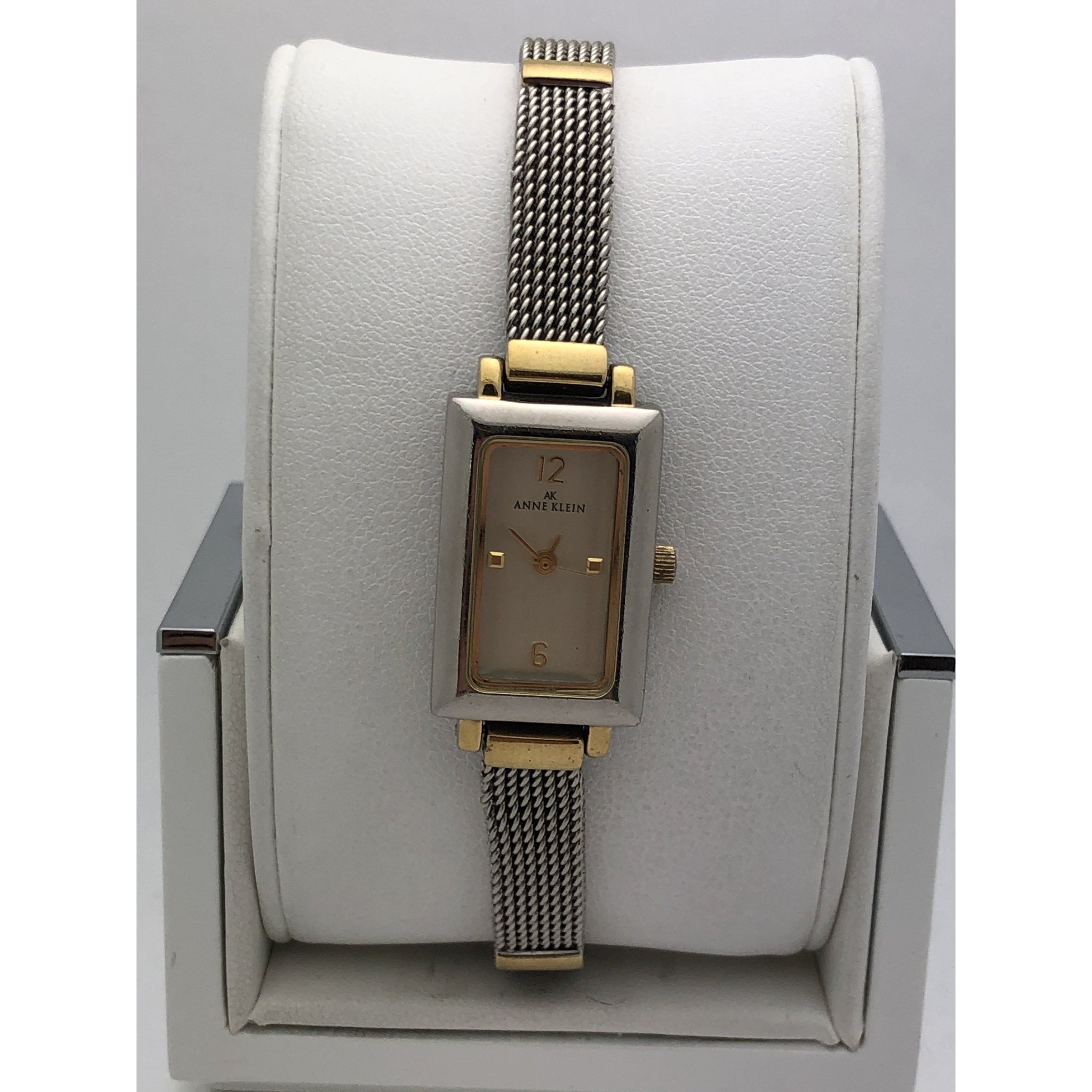 Anne Klein Women's AK/1980WTRG Diamond-Accented Dial White and Rose  Gold-Tone Bangle Watch : Amazon.in: Fashion