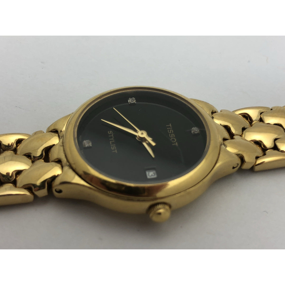 Tissot Ladies Stylist Black Dial Gold Tone Stainless Steel Watch K201