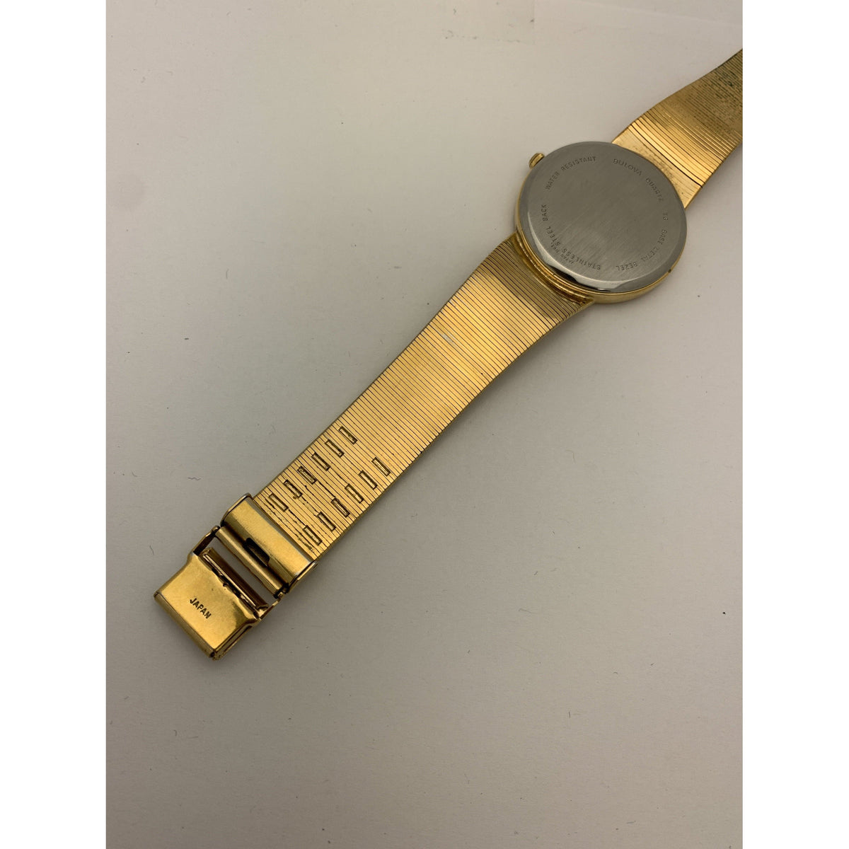 Caravelle by Bulova Unisex Black Dial Gold Tone Stainless Steel Watch 42M21