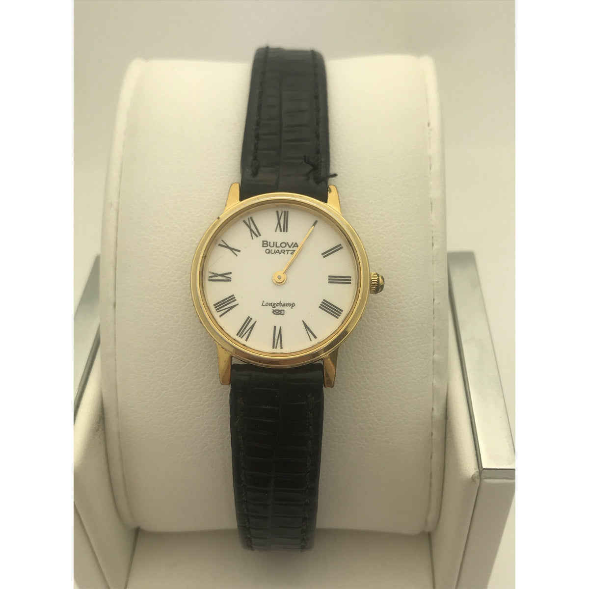 Bulova Ladies Longchamp Quartz White Dial Black Leather Strap Watch 056407