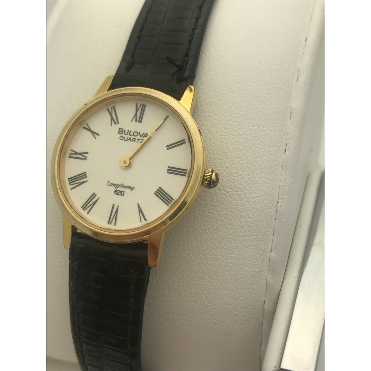 Bulova Ladies Longchamp Quartz White Dial Black Leather Strap Watch 056407